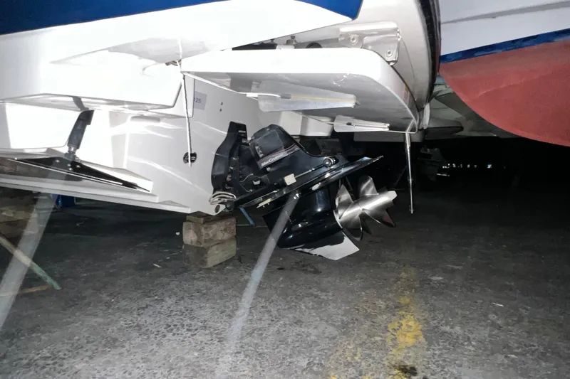 Slide: The Image of 2017 Sea Ray 280 SLX boat propeller and stern drive on display. - 12