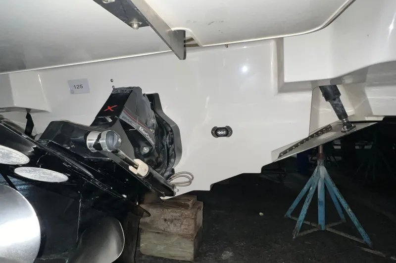 Slide: The Image of Close-up of 2017 Sea Ray 280 SLX boat engine and propeller. - 13