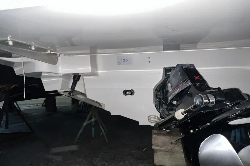 Slide: The Image of 2017 Sea Ray 280 SLX boat underside with MerCruiser engine detail. - 14