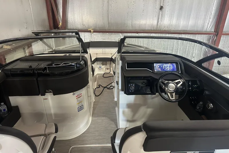 Slide: The Image of Interior of 2017 Sea Ray 280 SLX boat with modern dashboard and seating. - 16