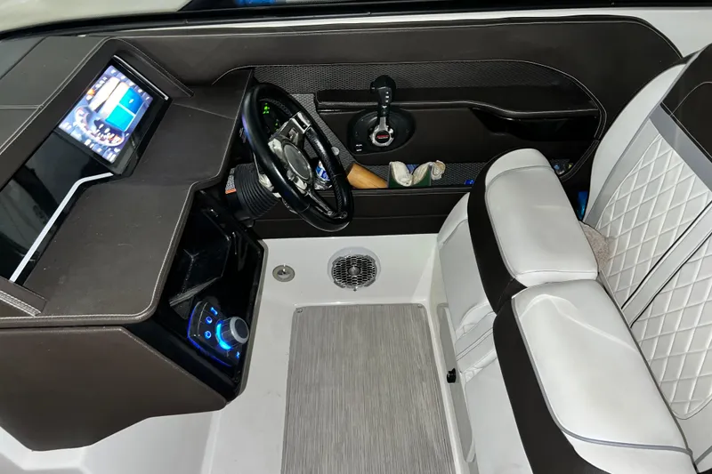 Slide: The Image of Interior of 2017 Sea Ray 280 SLX boat with modern dashboard and seating. - 22