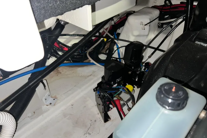 Slide: The Image of Engine compartment of 2017 Sea Ray 280 SLX with wiring and components. - 30