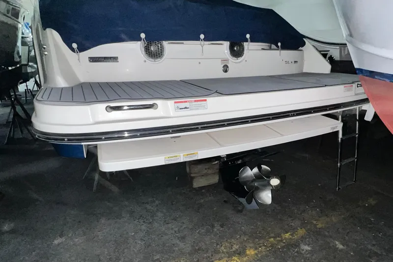 Slide: The Image of 2017 Sea Ray 280 SLX boat stern with swim platform and propeller. - 9