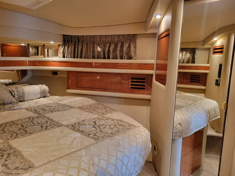 Slide: The Image of Luxurious bedroom interior of 2001 Sea Ray 450 Express Bridge yacht. - 16