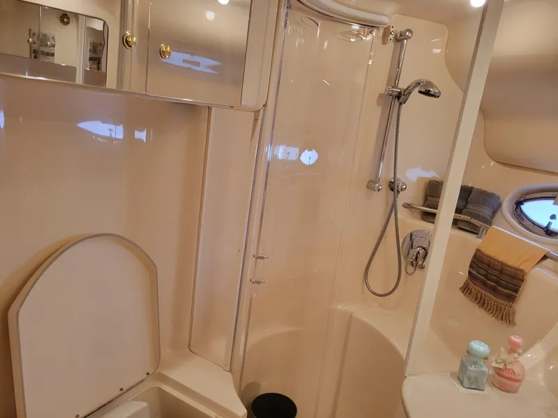 Slide: The Image of Luxurious bathroom in 2001 Sea Ray 450 Express Bridge yacht with shower and amenities. - 20