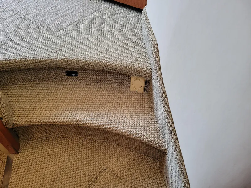 Slide: The Image of Carpeted stairs on 2001 Sea Ray 450 Express Bridge yacht interior. - 27