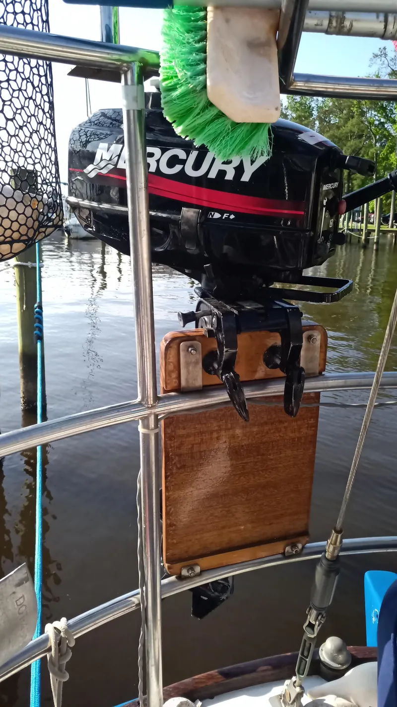 Slide: The Image of Outboard motor on a 1977 Ericson 31 sailboat. - 17