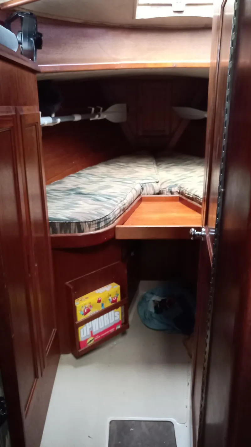 Slide: The Image of Interior of a 1977 Ericson 31 yacht with sleeping area. - 9