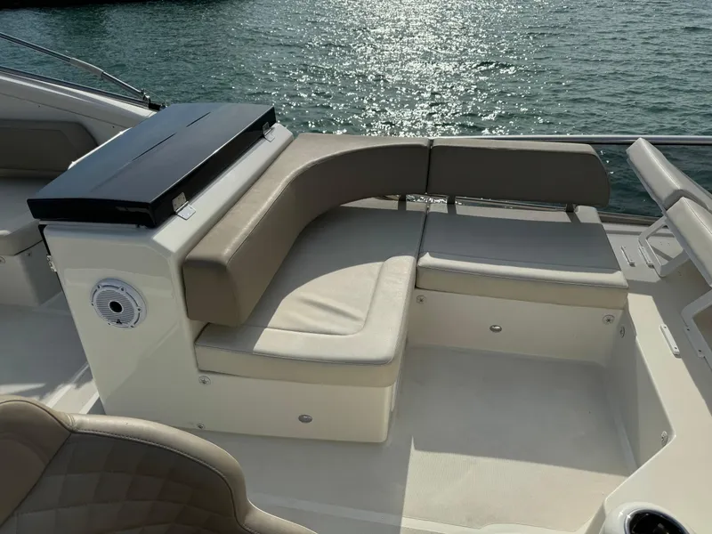 Slide: The Image of Luxurious seating area on a 2017 Absolute 50 Fly yacht, overlooking sparkling water. - 10