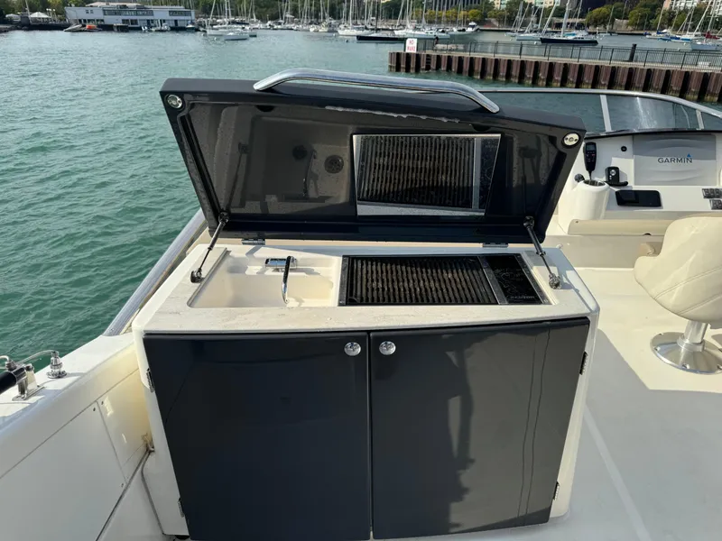 Slide: The Image of Outdoor kitchen on 2017 Absolute 50 Fly yacht with sink and grill. - 11