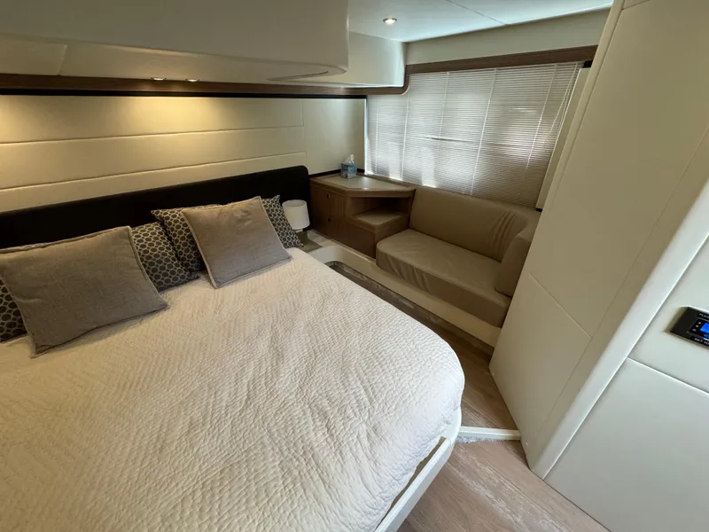 Slide: The Image of Luxurious bedroom interior of 2017 Absolute 50 Fly yacht with cozy bed and seating area. - 28
