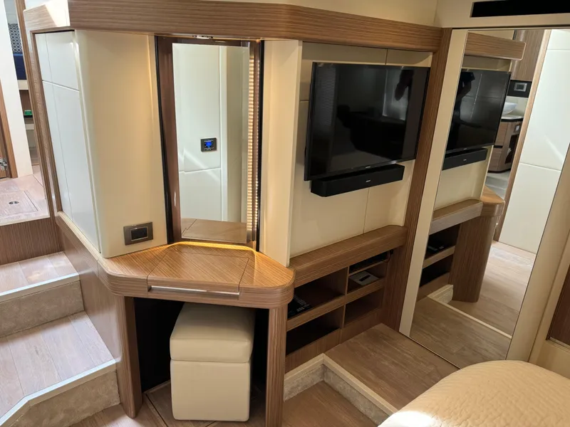 Slide: The Image of Luxurious interior of 2017 Absolute 50 Fly yacht with modern wood finishes and built-in TV. - 29