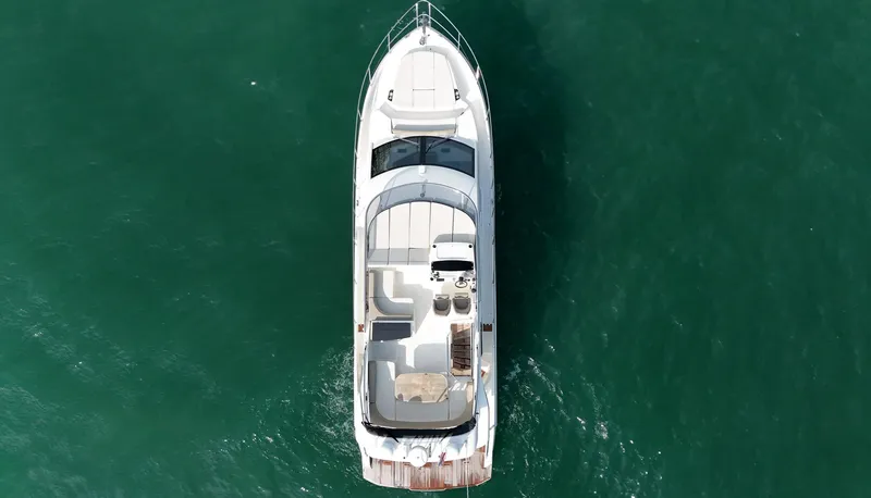 Slide: The Image of Aerial view of 2017 Absolute 50 Fly yacht on open water. - 3