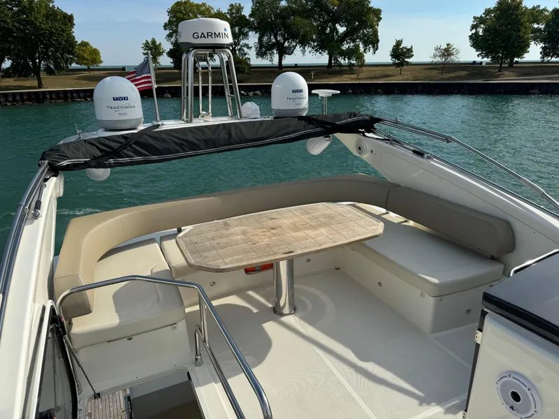 Slide: The Image of Luxury seating area on a 2017 Absolute 50 Fly yacht with Garmin equipment. - 7