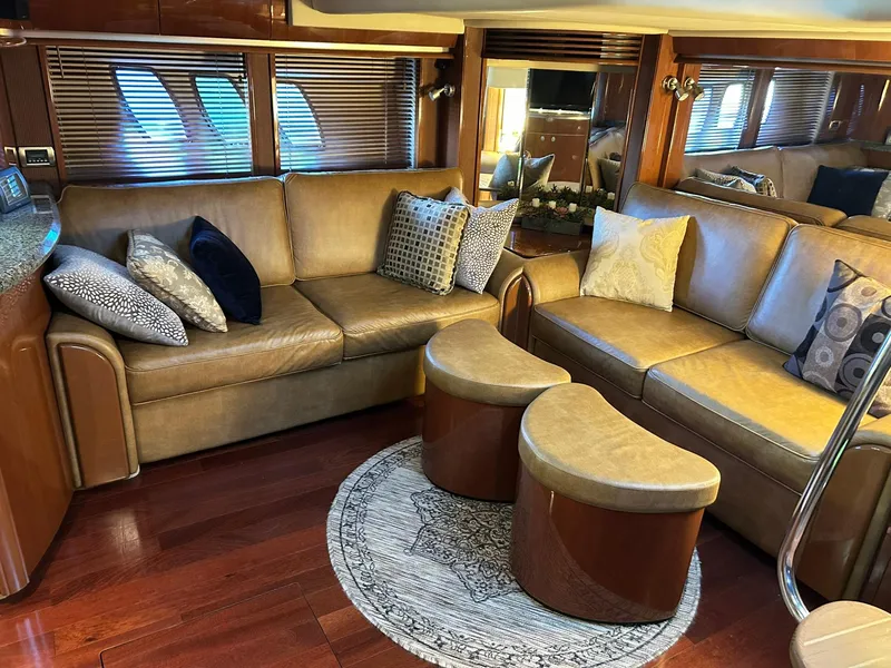 Slide: The Image of Luxurious 2007 Sea Ray 52 Sundancer yacht interior with leather seating and elegant decor. - 17