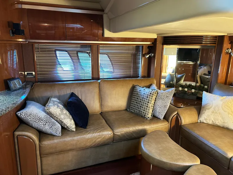 Slide: The Image of Luxurious interior of a 2007 Sea Ray 52 Sundancer yacht with plush seating and elegant decor. - 21