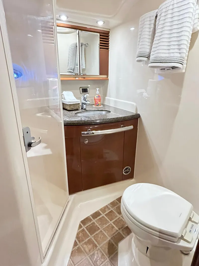 Slide: The Image of 2007 Sea Ray 52 Sundancer bathroom with modern fixtures and elegant design. - 42