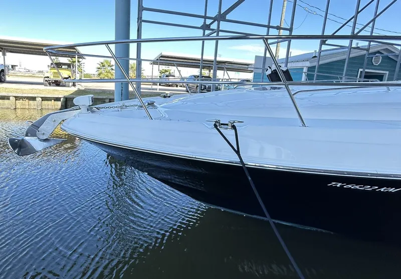 Slide: The Image of 2007 Sea Ray 52 Sundancer yacht docked in marina, side view. - 7