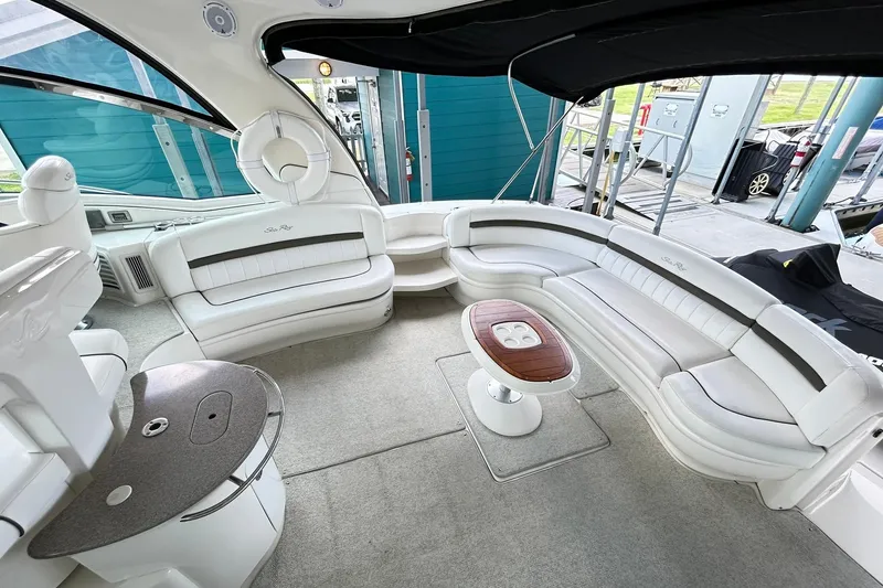 Slide: The Image of Luxurious interior of 2007 Sea Ray 52 Sundancer yacht with elegant seating and table. - 79
