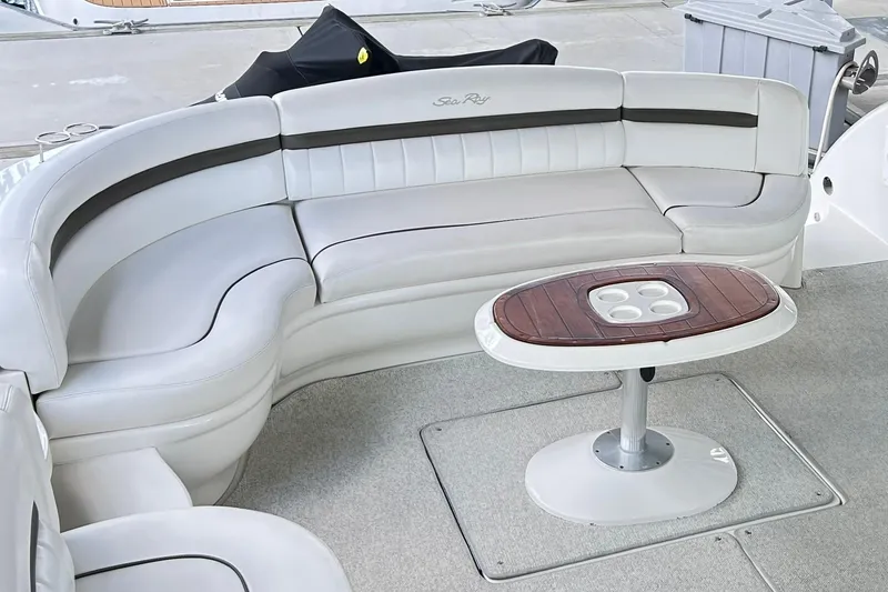 Slide: The Image of Luxurious seating area on a 2007 Sea Ray 52 Sundancer yacht with elegant table. - 81
