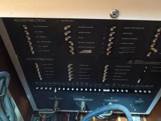 Slide: The Image of Electrical panel of 2004 Tiara Yachts 4400 Sovran, showing AC and DC distribution. - 21