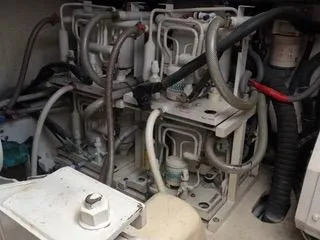 Slide: The Image of Engine compartment of 2004 Tiara Yachts 4400 Sovran with complex wiring and components. - 45