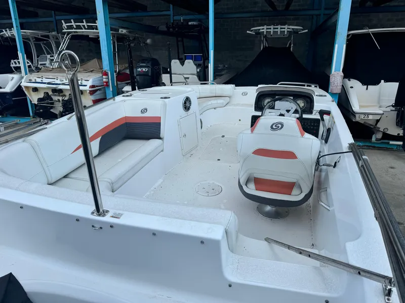 Slide: The Image of 2021 Hurricane 188 SunDeck Sport CC-OB boat interior with seating and steering console. - 6