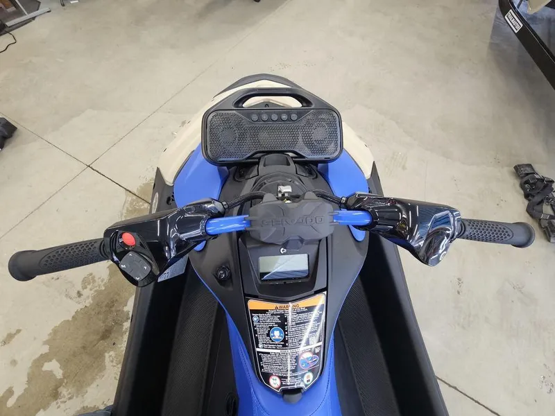 Slide: The Image of 2025 Sea-Doo Spark Trixx jet ski with audio system, top view of handlebars. - 4
