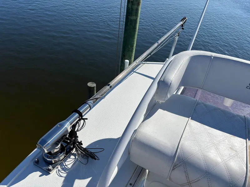 Slide: The Image of 2022 Costa Custom Boats 264HC, deck view with seating and railing. - 32