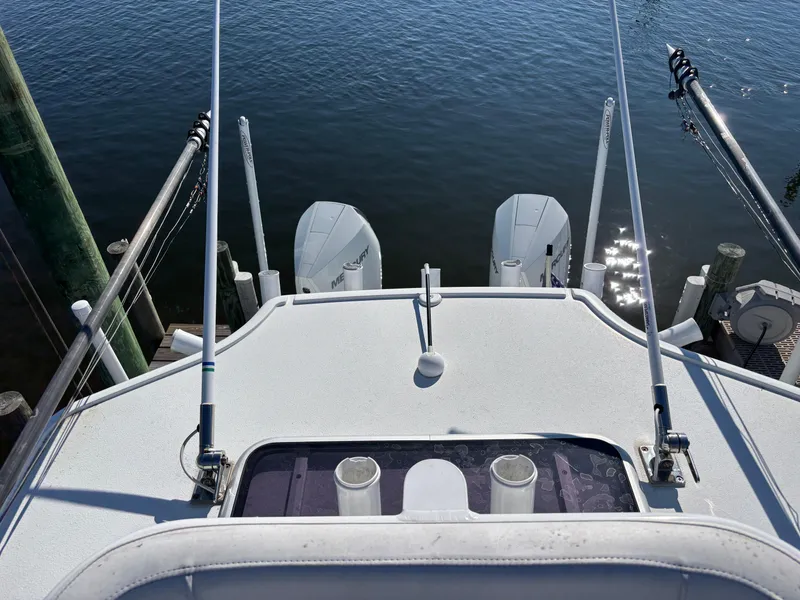 Slide: The Image of Costa Custom Boats 264HC 2022 model, view from deck with twin engines. - 34