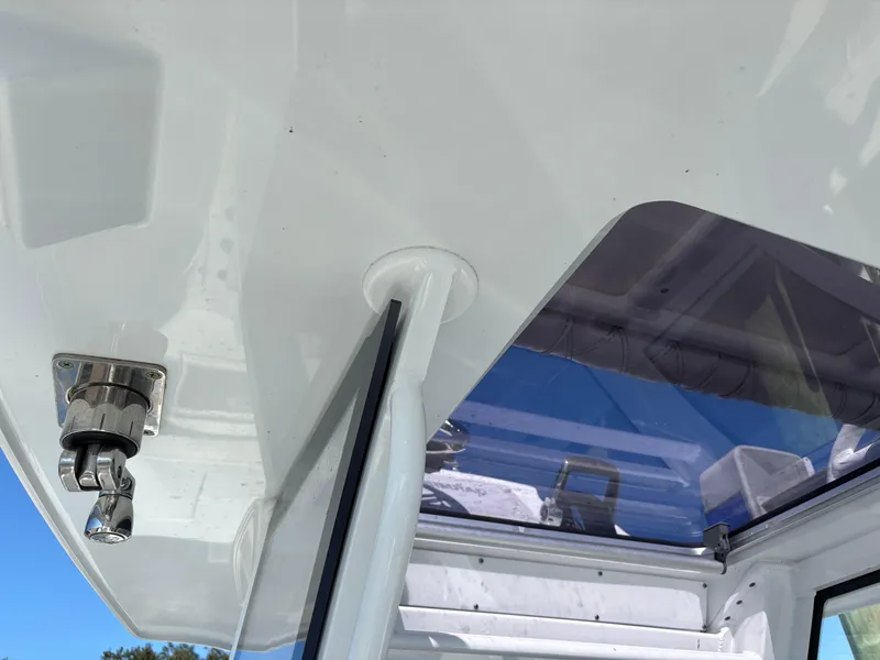 Slide: The Image of Costa Custom Boats 264HC 2022 model, interior view with sleek design and window details. - 49