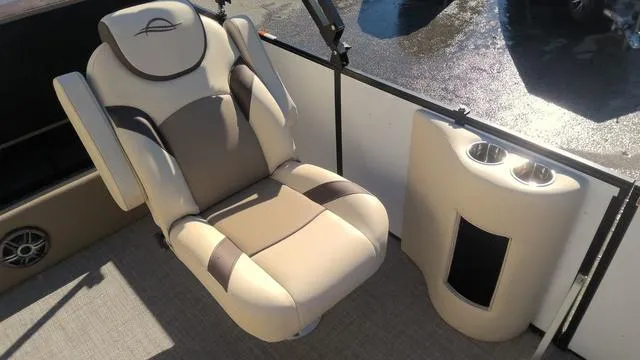 Slide: The Image of Luxurious seating on 2025 SunCatcher Select 324SL pontoon boat with cup holders. - 7