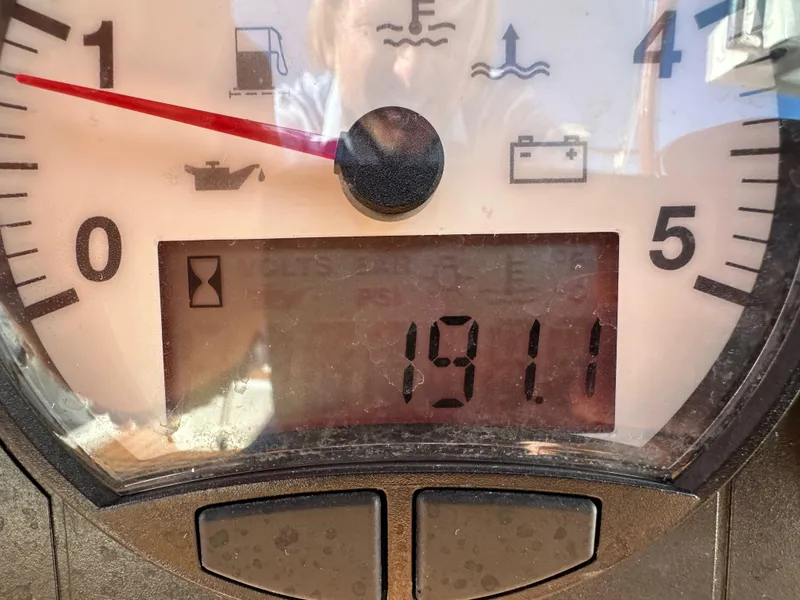 Slide: The Image of Close-up of Jeanneau 57 gauge displaying 1911 hours, 2013 model. - 40