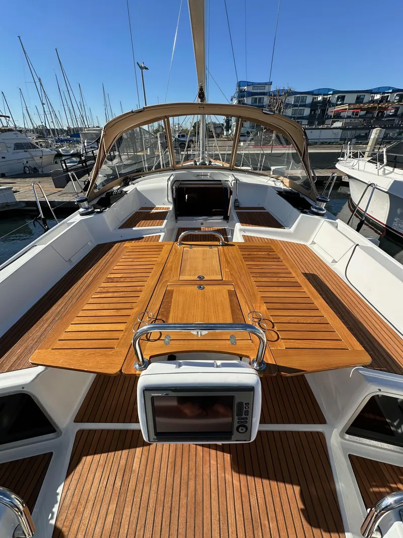 Slide: The Image of 2013 Jeanneau 57 yacht with spacious teak deck and modern cockpit. - 45