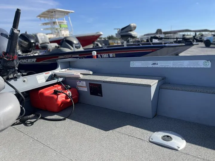 Slide: The Image of 2018 G3 Guide V150 T boat interior with storage and fuel tank. - 10