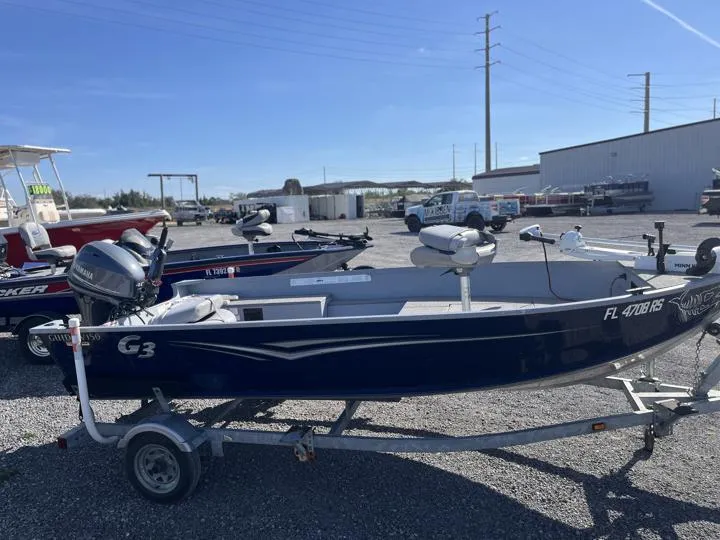 Slide: The Image of 2018 G3 Guide V150 T boat on trailer in outdoor lot. - 5
