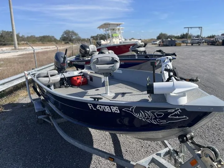 Slide: The Image of 2018 G3 Guide V150 T fishing boat on trailer, parked outdoors. - 6