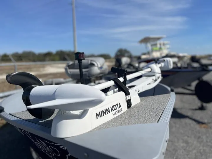 Slide: The Image of Minn Kota Maxxum motor on 2018 G3 Guide V150 T boat, outdoor setting. - 8