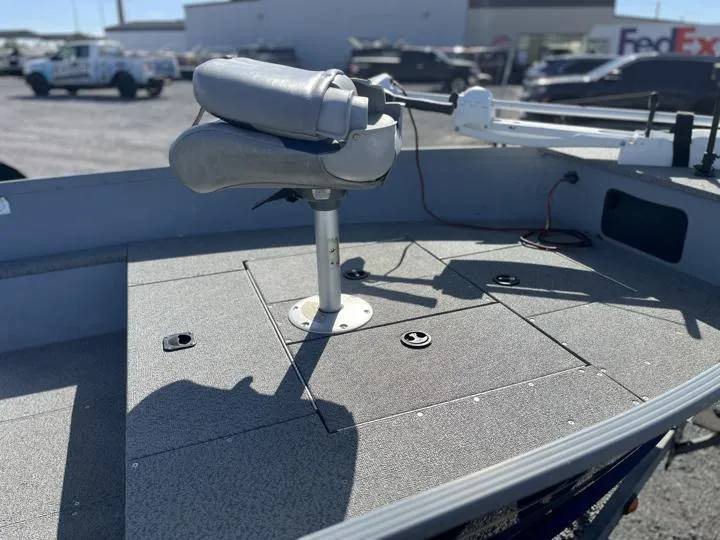 Slide: The Image of 2018 G3 Guide V150 T boat deck with swivel seat and storage compartments. - 9