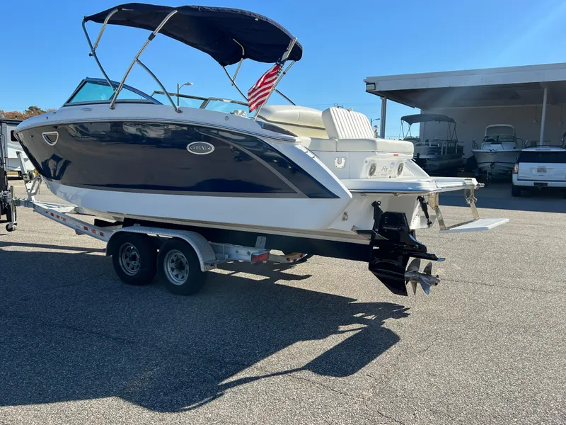 Slide: The Image of 2014 Cobalt R5 boat with white seating and swim platform. - 11