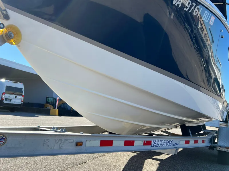 Slide: The Image of 2014 Cobalt R5 boat on trailer, close-up view of hull and trailer. - 15