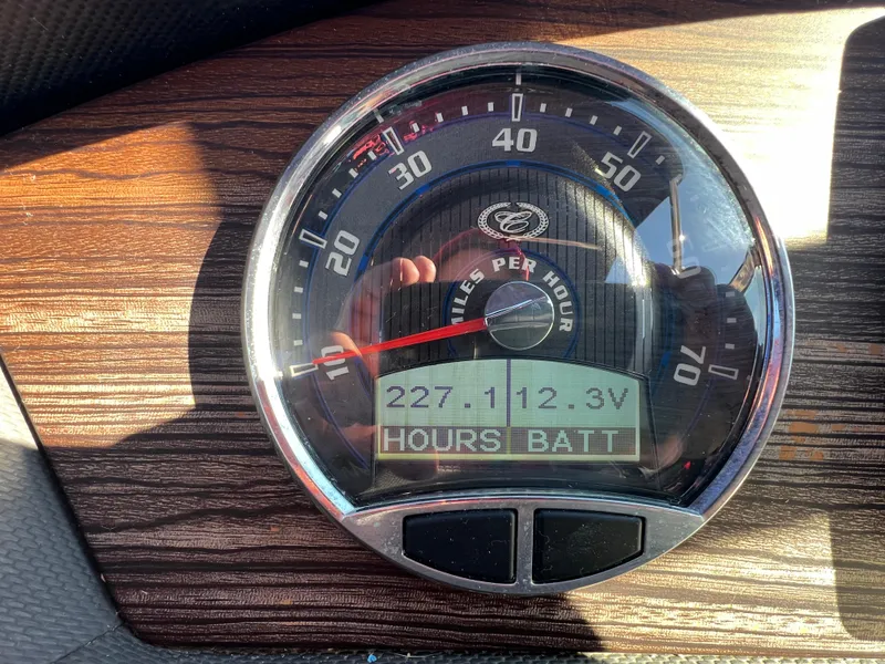 Slide: The Image of Cobalt R5 2014 speedometer displaying 227 hours and 12.3 volts on wood grain dashboard. - 29