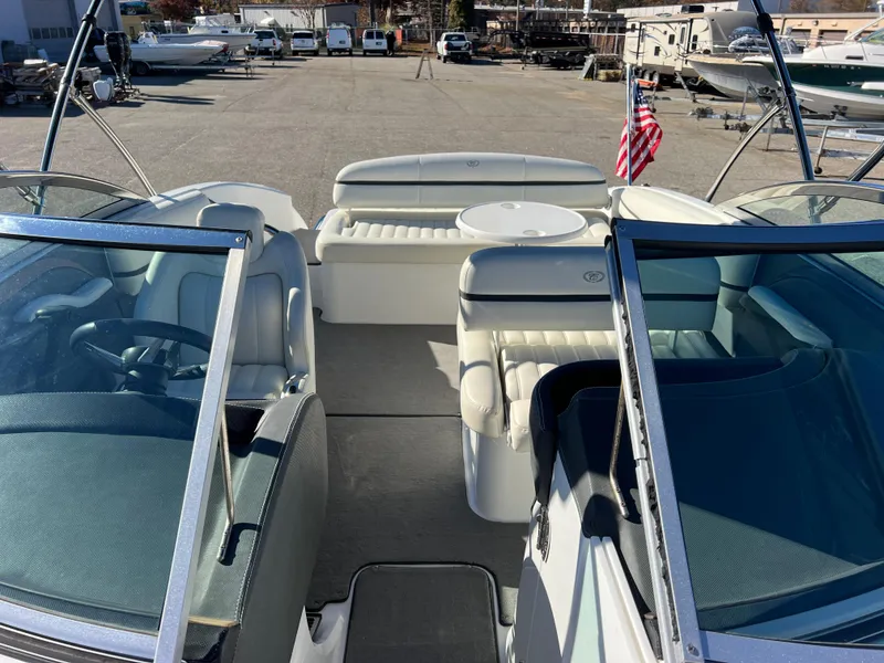 Slide: The Image of 2014 Cobalt R5 boat interior with seating and American flag. - 39