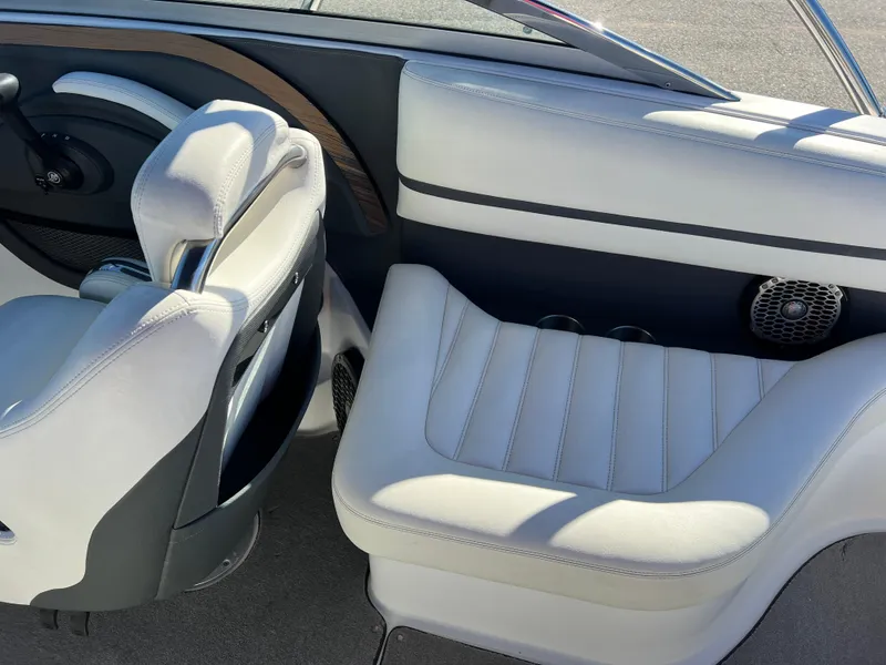 Slide: The Image of Interior of a 2014 Cobalt R5 boat with white leather seating. - 41