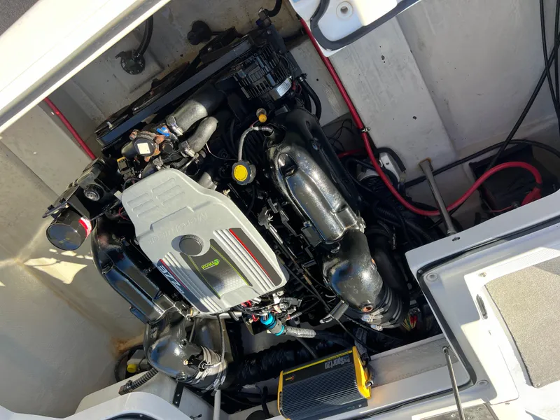 Slide: The Image of 2014 Cobalt R5 engine compartment with visible components and wiring. - 43