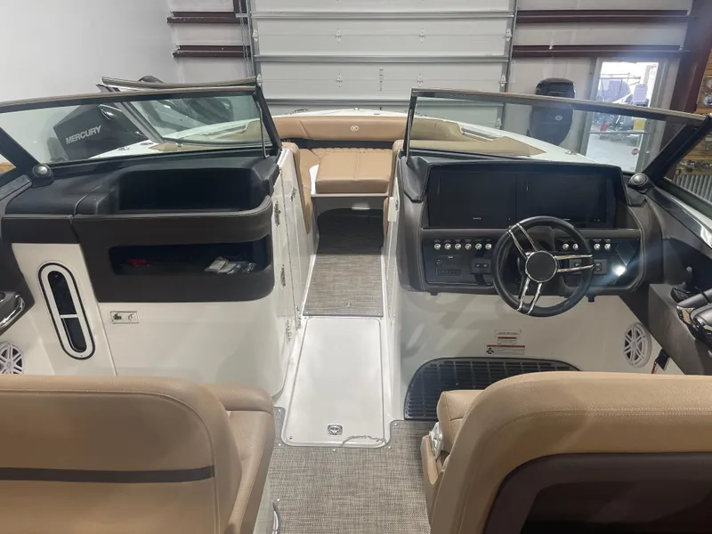 Slide: The Image of 2022 Cobalt 30 SC boat interior with dual consoles and modern steering wheel. - 11