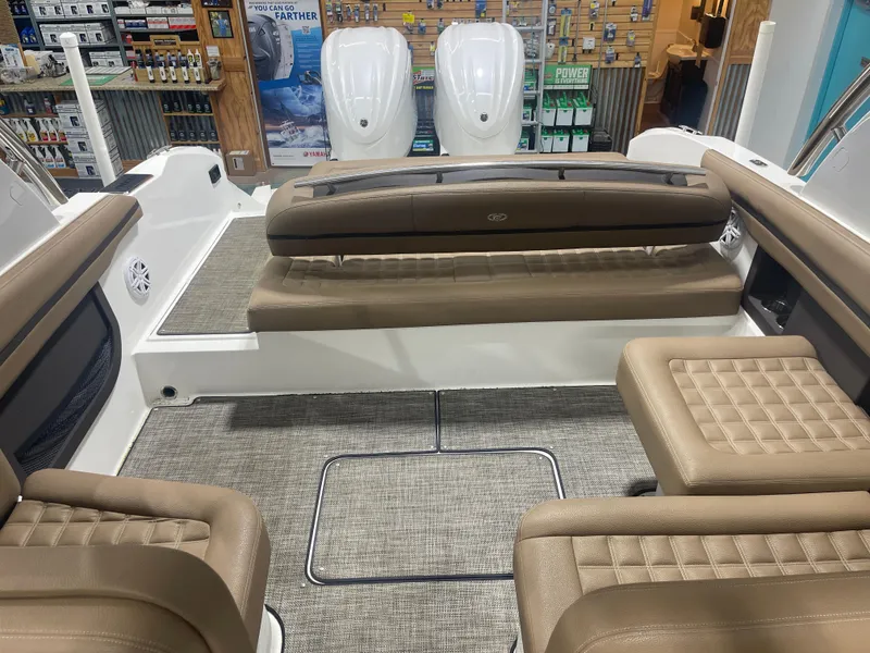 Slide: The Image of Interior of 2022 Cobalt 30 SC boat with tan leather seating and modern design. - 17