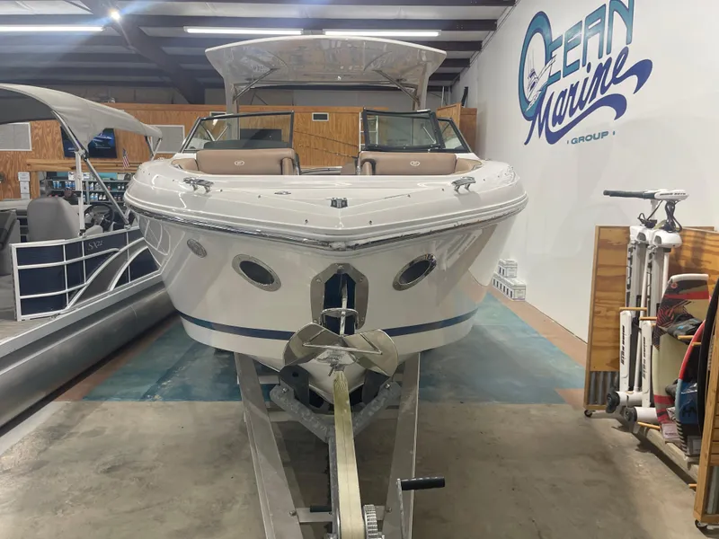 Slide: The Image of 2022 Cobalt 30 SC boat displayed indoors at Ocean Marine Group. - 3