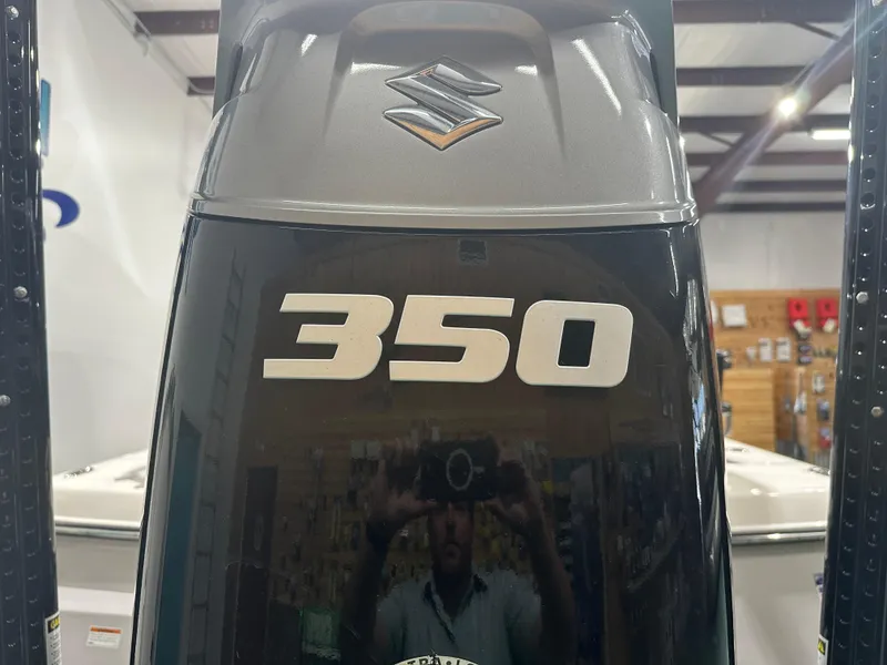 Slide: The Image of Suzuki 350 outboard motor on 2023 Sea Born FX 25 boat. - 10