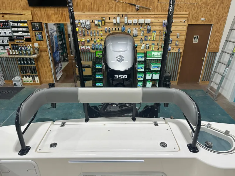 Slide: The Image of 2023 Sea Born FX 25 boat with Suzuki 350 engine in a showroom. - 17